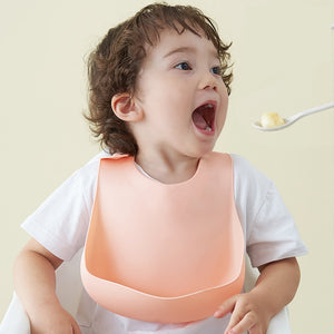 Fashionable silicon Breastplate Baby Bib Waterproof Solid Infant